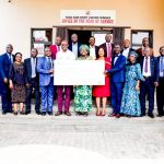 The Forum of HOS, PS, GM, ES and Provost led by the State Head of Service presents a cheque to Oyo State Health Insurance Agency.